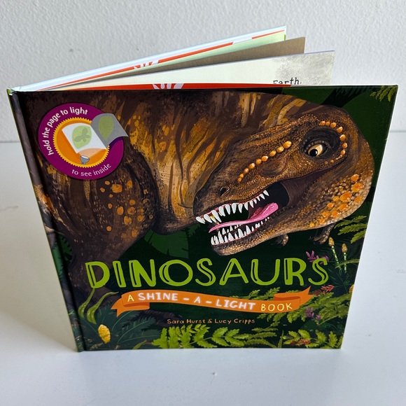 Dinosaurs A-Shine-A-Light interactive book by Sara Hurst, Lucy Cripps. For kids. - Picture 1 of 9